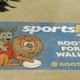 Illustration for article titled Giant Rugby Ad in Australia Features a Wallaby Probably Raping a Lion